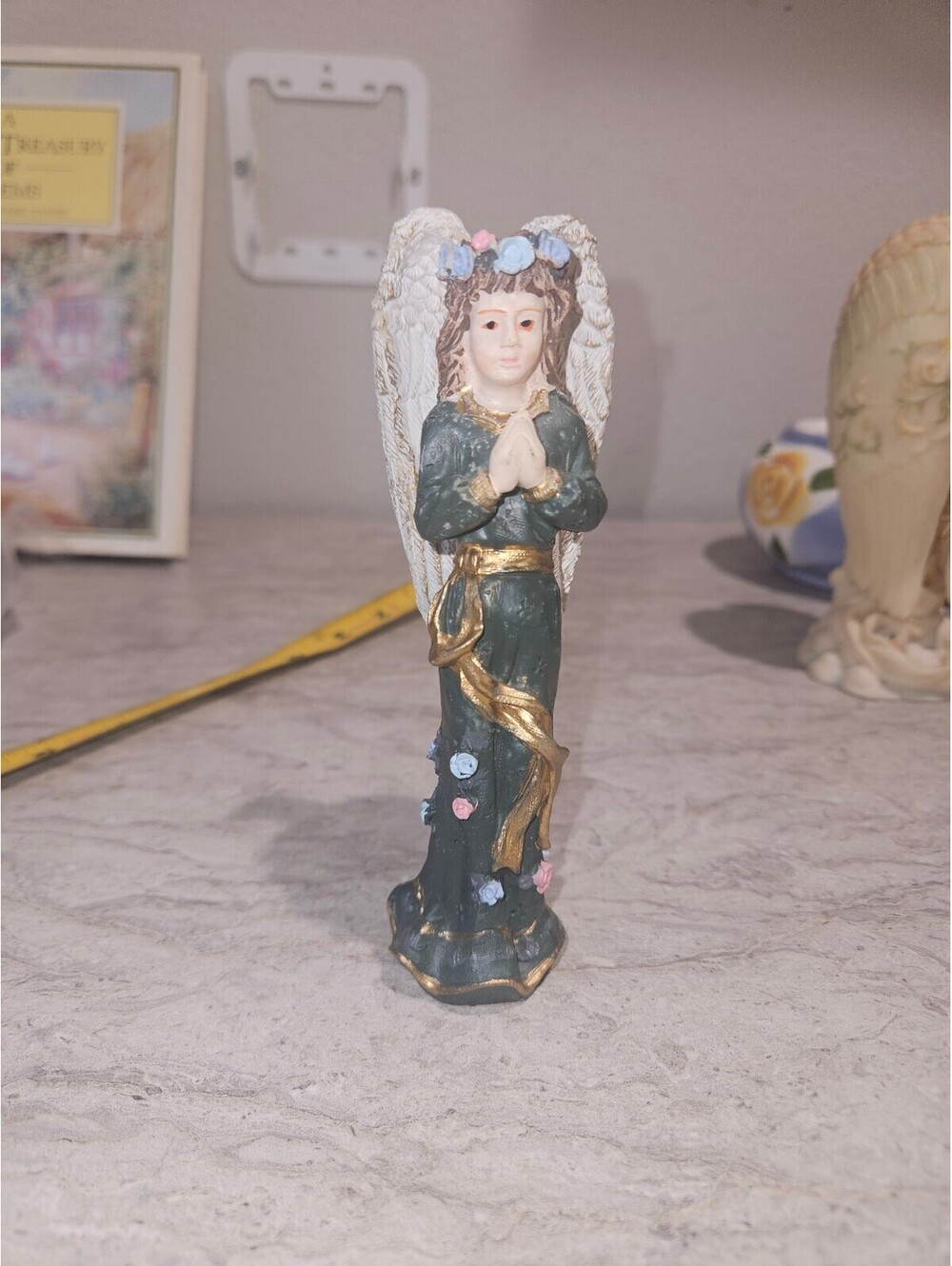 Hand-Painted Angel Figurine with Floral Details